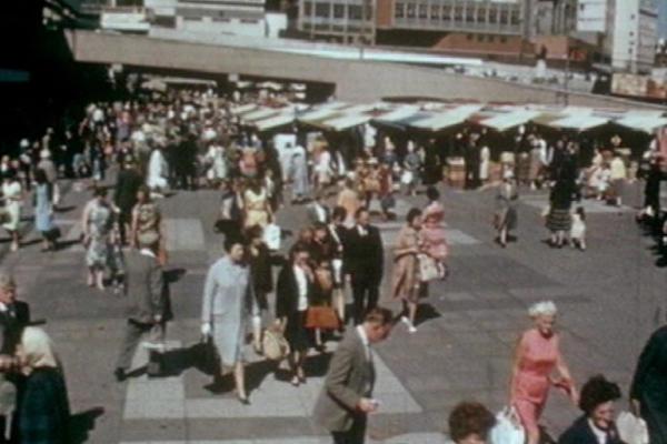Image of people walking around Birmingham City centre.