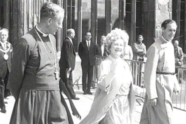 Black and white image of a royal visit in Coventry.
